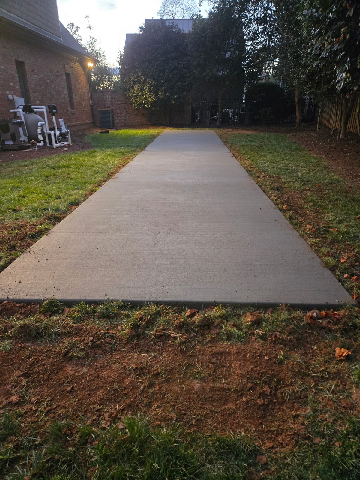 Concrete pad poured for sport court base NC