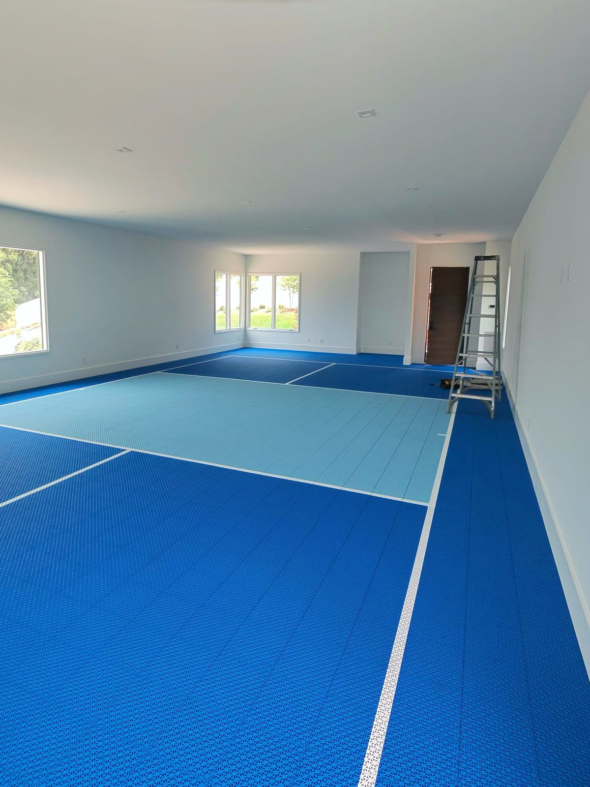 Custom indoor pickleball court in a home