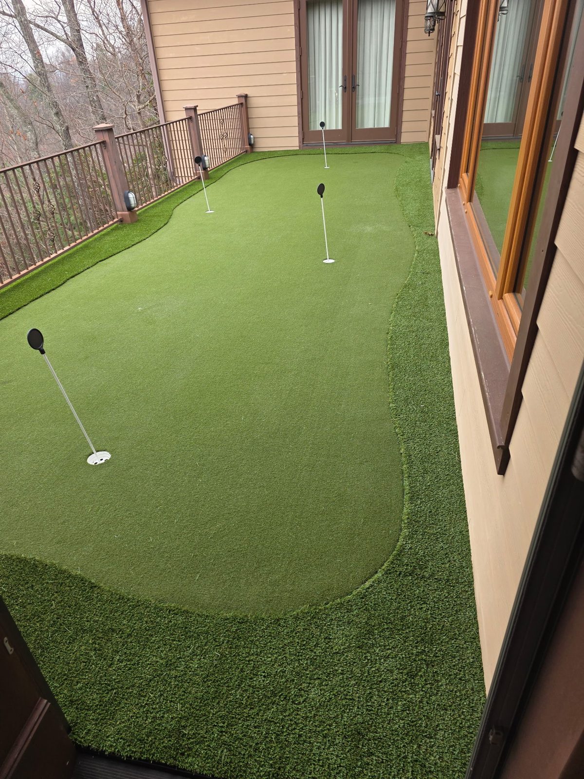 Custom backyard putting green installation