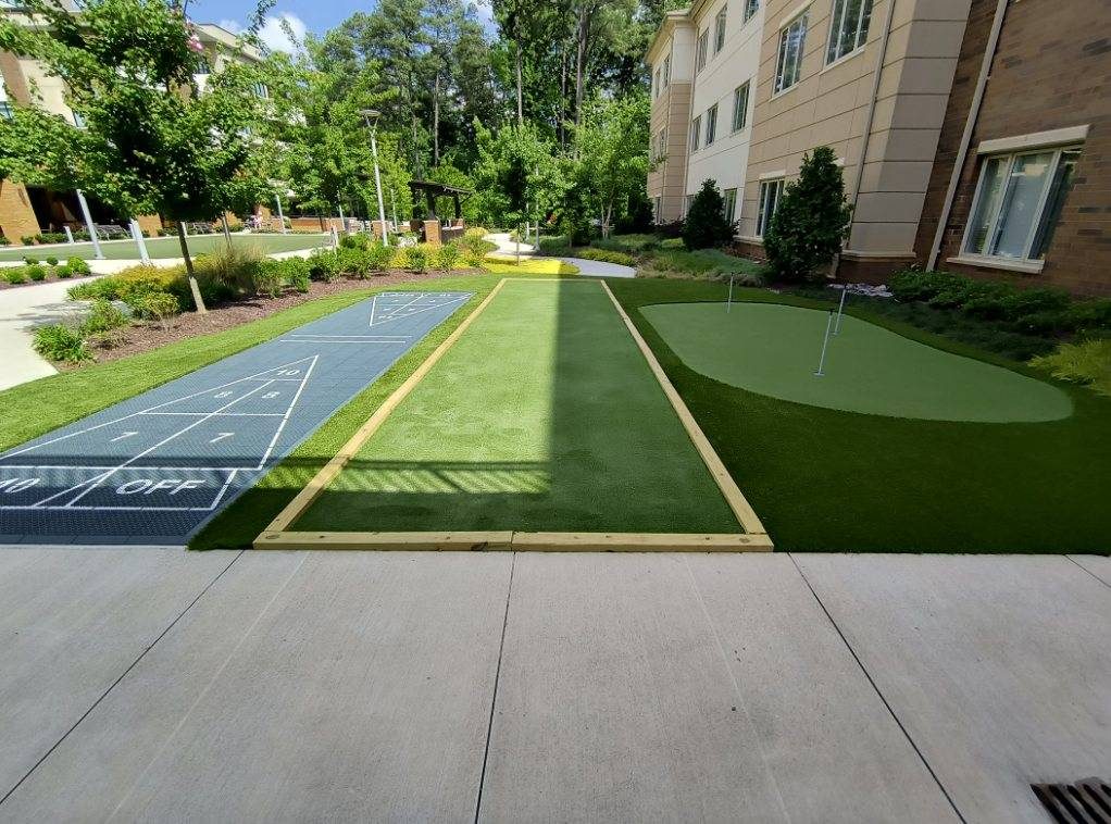 Backyard golf green with flags