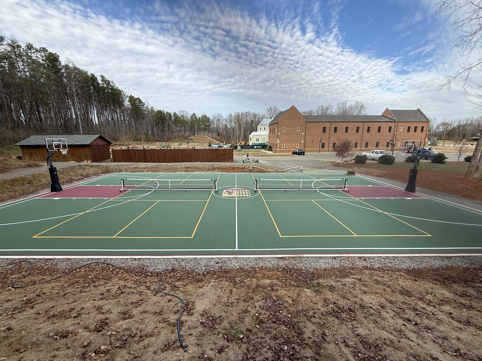 Multi-sport court with basketball and pickleball lines