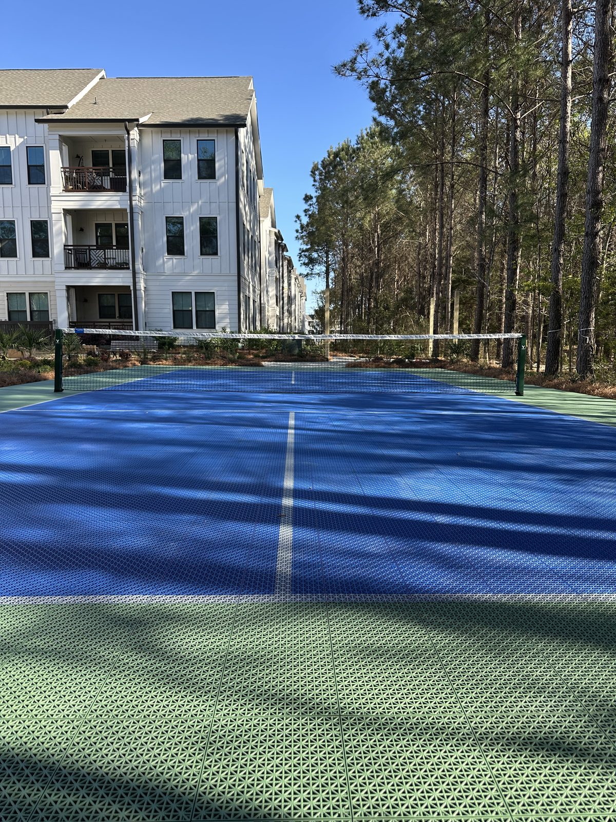 Blue and green pickleball court installation